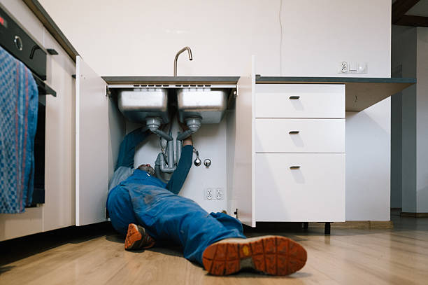 Professional Emergency Plumber technician working in Rexburg, ID